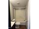 Compact bathroom featuring a shower-tub combination and wood-look flooring at 30 Jamestown Ct Ct, Zebulon, NC 27597