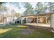 Exterior view of the attached garage, carport, and storage, adding parking and convenience at 3012 Optimist Farm Rd, Apex, NC 27539