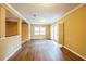 Inviting living room with hardwood floors, neutral walls, and lots of natural light at 3012 Optimist Farm Rd, Apex, NC 27539