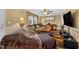 Inviting living room with a cozy sofa, decor, and natural light from the window at 3012 Optimist Farm Rd, Apex, NC 27539