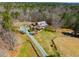 Secluded home on acreage with long driveway, fenced pasture, and outdoor fireplace at 3227 Morrow Farm Ln, Chapel Hill, NC 27516