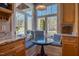 Charming breakfast nook with custom seating, a round table, and lots of natural light at 3227 Morrow Farm Ln, Chapel Hill, NC 27516