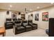 Home theater with leather recliners, movie screen, projector and surround sound speakers at 3227 Morrow Farm Ln, Chapel Hill, NC 27516