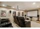 Home theater with leather recliners, movie screen, projector and surround sound speakers at 3227 Morrow Farm Ln, Chapel Hill, NC 27516