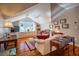 Cozy living room with built-in storage, hardwood floors, and comfortable seating at 3227 Morrow Farm Ln, Chapel Hill, NC 27516