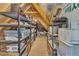 Walk-up attic with ample room for storage; shelving units provide organization at 3240 Donlin Dr, Wake Forest, NC 27587