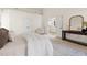 Carpeted bedroom with private entry to the bathroom and vaulted ceilings at 3541 Rugby Rd, Durham, NC 27707