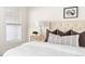 Bedroom with modern interior design boasts a neutral color palette and a cozy atmosphere at 3541 Rugby Rd, Durham, NC 27707