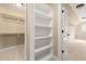Walk-in closet with built-in shelving and ample storage space at 3541 Rugby Rd, Durham, NC 27707