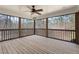 Screened-in porch provides scenic views of the wooded backyard at 3541 Rugby Rd, Durham, NC 27707