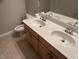 Bright bathroom features a double sink vanity with a modern mirror and lighting at 3709 Valley Pine Ct, Wendell, NC 27591