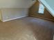 Spacious bedroom with plush carpeting and a bright window, providing a comfortable retreat at 3709 Valley Pine Ct, Wendell, NC 27591