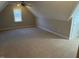 Cozy bedroom features carpeted floors, a vaulted ceiling, and a window to let in natural light and fresh air at 3709 Valley Pine Ct, Wendell, NC 27591