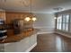 Kitchen features stainless steel appliances and a breakfast bar at 3709 Valley Pine Ct, Wendell, NC 27591