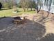 Brick patio features a cozy fire pit, perfect for outdoor gatherings at 3709 Valley Pine Ct, Wendell, NC 27591