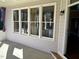 Relax on this bright porch, with large windows and neutral colors at 3709 Valley Pine Ct, Wendell, NC 27591