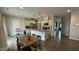 Expansive kitchen and breakfast nook with stainless steel appliances, a large island, and ample cabinet space at 49 W Copenhaver Dr, Clayton, NC 27527