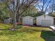 Spacious backyard features three storage sheds and mature trees at 5108 Melbourne Rd, Raleigh, NC 27606