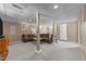Spacious finished basement featuring neutral carpet, wood support beams, and comfortable seating at 5108 Melbourne Rd, Raleigh, NC 27606