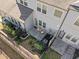 A quaint backyard with a patio, table, chairs, and a partial fence at 517 Aronia Dr, Hillsborough, NC 27278