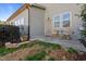 Home's patio area has outdoor seating in the backyard surrounded by a black metal fence at 517 Aronia Dr, Hillsborough, NC 27278