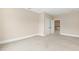 Bedroom with neutral walls and carpet leading to another room at 525 Fallon Grove Way, Raleigh, NC 27608