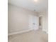 Bedroom featuring carpet and double closet doors at 525 Fallon Grove Way, Raleigh, NC 27608
