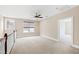 Large bonus room with ceiling fan and bright window at 525 Fallon Grove Way, Raleigh, NC 27608