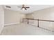 Large bonus room with ceiling fan and views of the stairway at 525 Fallon Grove Way, Raleigh, NC 27608