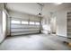 Clean, well-lit garage with storage shelves and an automatic door opener at 525 Fallon Grove Way, Raleigh, NC 27608