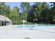Community pool with a mushroom fountain and lots of open deck space to lounge and soak up the sun at 5513 Edgebury Rd, Raleigh, NC 27613