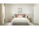 Serene bedroom with a full bed, stylish bedside tables, soft lighting, and a peaceful setting at 712 Swim Cave Ln, Wendell, NC 27591