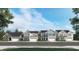 Street view showcasing a row of beautifully designed homes with inviting curb appeal at 712 Swim Cave Ln, Wendell, NC 27591