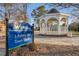 Scenic town square featuring a gazebo in a park-like setting with beautiful landscaping at 712 Swim Cave Ln, Wendell, NC 27591