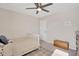 Bright bedroom with neutral walls, carpet, and a ceiling fan, creating a calming and serene atmosphere at 724 Summer Music Ln, Raleigh, NC 27603