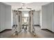 Modern gym featuring strength training equipment and neutral color carpeting at 724 Summer Music Ln, Raleigh, NC 27603