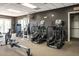 Gym showcasing ellipticals and weightlifting equipment on neutral colored carpeting at 724 Summer Music Ln, Raleigh, NC 27603