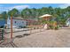 Playground featuring swings, slides, and climbing equipment, perfect for community fun at 724 Summer Music Ln, Raleigh, NC 27603