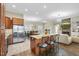 Open concept kitchen with granite counters, stainless appliances and a large island at 73 Vibernum Vw, Four Oaks, NC 27524