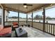 Relaxing screened porch with cozy seating and a lovely view of the surrounding landscape at 73 Vibernum Vw, Four Oaks, NC 27524