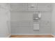 Spacious walk-in closet with wooden floors and ample shelving for storage and organization at 734 Hornchurch Loop, Cary, NC 27519