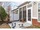 View of a patio featuring a screened in porch and outdoor seating area at 734 Hornchurch Loop, Cary, NC 27519