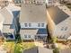 Aerial view of a lovely home with a screened-in porch and backyard at 805 Historian St, Raleigh, NC 27603