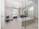 Bright bathroom showcasing a tub, shower, vanity, and tiled floors at 832 Mountain Vista Ln, Cary, NC 27519