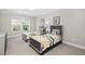 Charming bedroom featuring two twin beds, natural light, and stylish decor at 832 Mountain Vista Ln, Cary, NC 27519