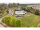Aerial showcasing the pool, playground, and ample green space for Gathering enjoyment and relaxation at 832 Mountain Vista Ln, Cary, NC 27519
