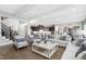 Spacious living room with an open floor plan, flowing into the kitchen at 832 Mountain Vista Ln, Cary, NC 27519