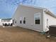 Exterior view of backyard featuring a concrete patio with chairs at 8630 Kenridge Ln, Fuquay Varina, NC 27526