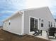 Exterior view of backyard featuring a concrete patio with chairs at 8630 Kenridge Ln, Fuquay Varina, NC 27526