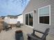Exterior view of backyard featuring a concrete patio with chairs at 8630 Kenridge Ln, Fuquay Varina, NC 27526